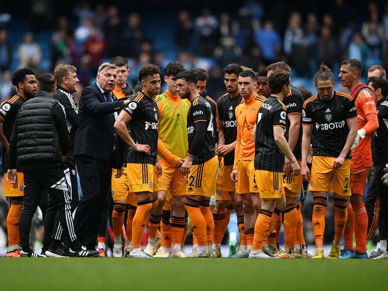 The players huddle at the end of the game. 