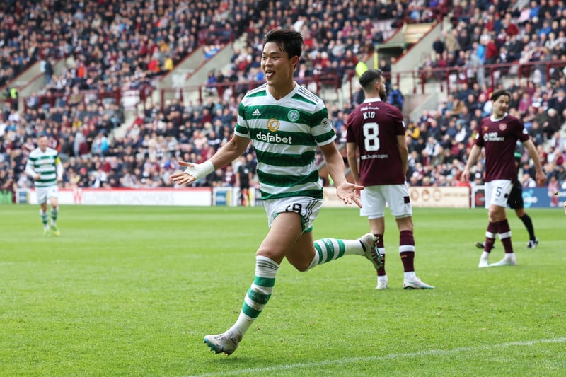 Oh Hyeon-gyu wheels away to celebrate his exquisite finish.