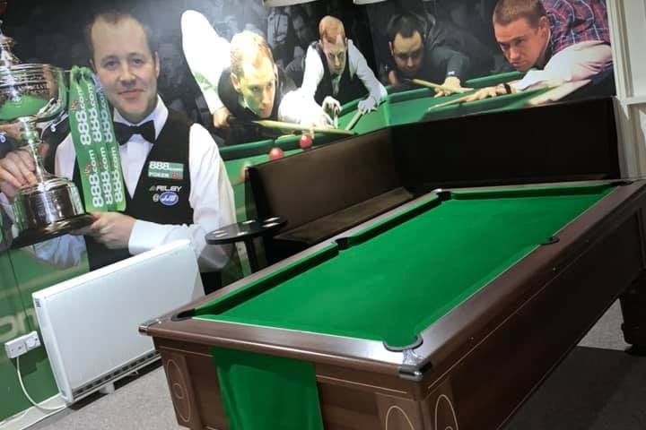 If you’re a snooker fan, the Masters Snooker Club is a must-visit. For a guest it costs just a pound to enter, and the pints don’t cost too much more than that either. Located in an unassuming upstairs venue, you would think you were walking into someone’s flat if it weren’t for the massive Masters Snooker Club mural above the front door. John Higgins spent much of his early days learning the gentleman’s game in this very hall, and this a massive point of pride for the owners - as seen by the murals on the wall above the pool tables.