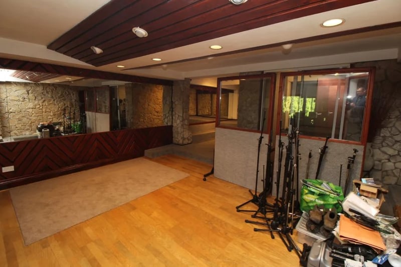 In the basement space of the house is a large, soundproofed music studio