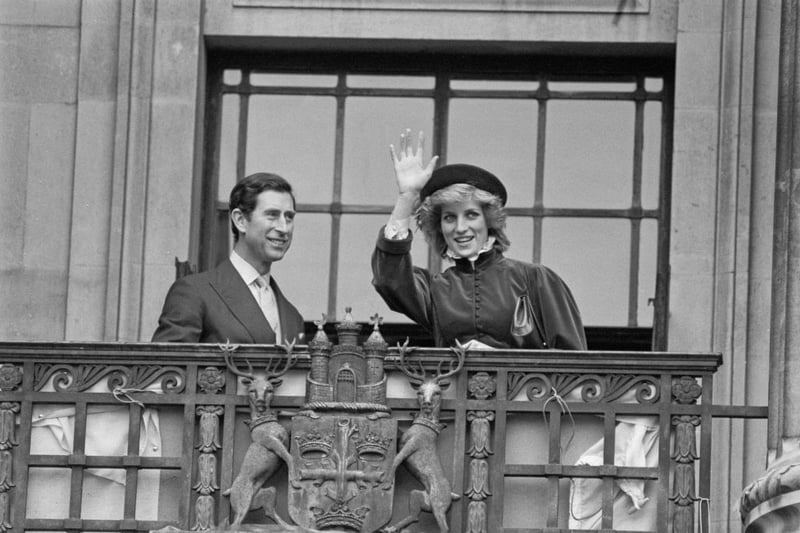 Diana, Princess of Wales (1961-1997), wearing a Caroline Charles outfit with a hat by John Boyd, and Charles, Prince of Wales waving from the balcony of Nottingham Council House
