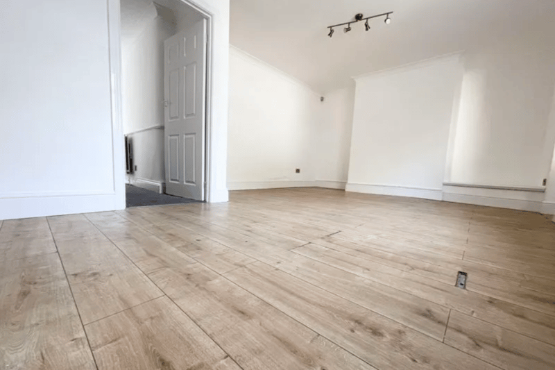 This room has laminated flooring which is usual in the warmer months