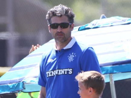 Grey’s Anatomy star claims he supports Rangers after his step-grandfather passed it on to his own sons. Spotted wearing a Gers strip at his sons’ football match in LA in May 2016. (Image: www.splashnews.com)