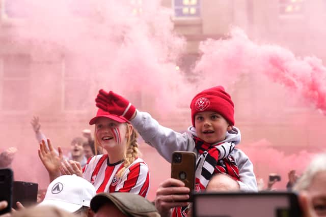 Two young Blades fans enjoy the moment 