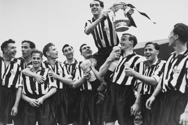 Newcastle United celebrating their win in the FA Cup Final match against Blackpool.