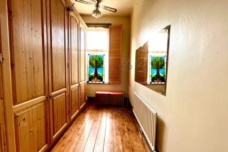 There is also a walk in closet space in the property with a beautiful stained glass window