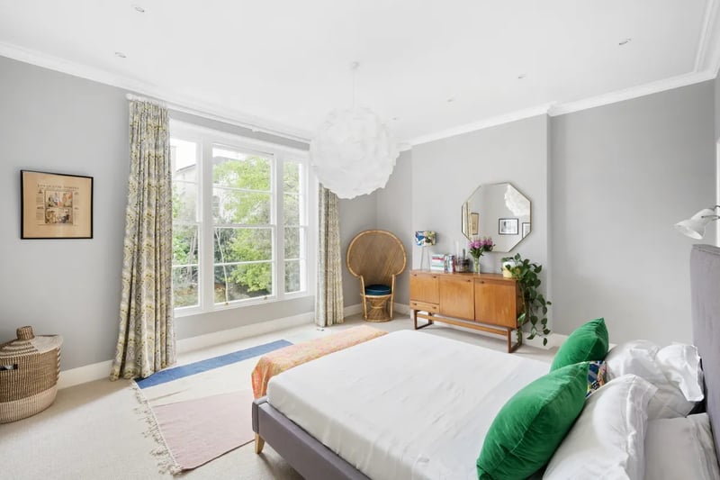 "Across the first floor, a unique benefit to the slim side-return is to give the master bedroom, situated to the rear, the benefit of the full width of the house creating a dramatic bedroom space, whilst still providing access for a beautifully appointed en-suite shower room.”