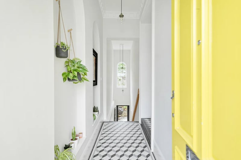 “Once inside, the extent and creativity of the house is immediately obvious; with a beautifully crafted entrance hall leading towards the bespoke rear staircase stepping down to the lower ground floor and, to the right, access into the inner hallway, stairwell and boot cupboard.”