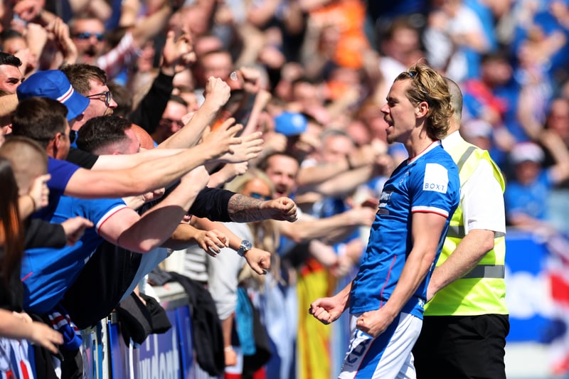 Todd Cantwell celebrates his early 5th minute opener with ecstatic Rangers supporters.
