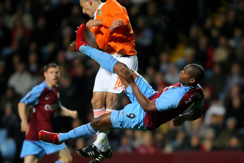 Harewood strikes a defender in the face with a brave challenge.