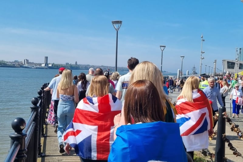 Eurovision fans meander around the Liverpool waterfront