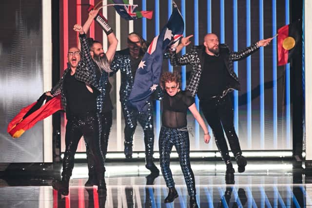 Band Voyager of Australia appears on stage during the final. Image: PAUL ELLIS/AFP via Getty Images