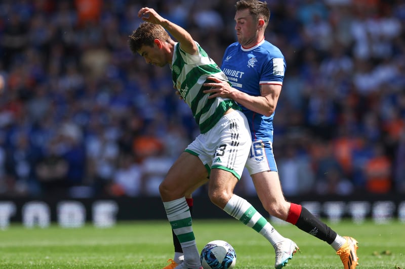 Matt O’Riley of Celtic is challenged by John Souttar of Rangers, who excelled for the home side.