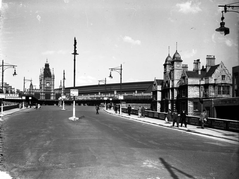 This picture from the Hartley Collection shows a very quiet entrance to the station with only a few vehicles seen parked near the main entrance.