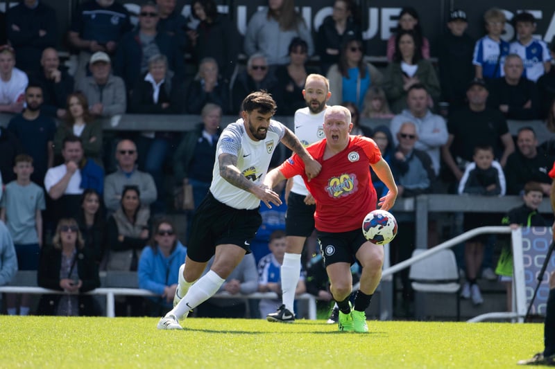 Marlon Pack and Ex Man U player Paul Scholes in action. 