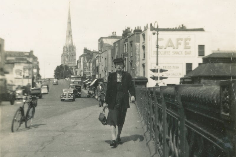 A stern-looking lady crosses over Bedminster Bridge in the early 1950s. The west side of Redcliffe Hill was still a bomb site.