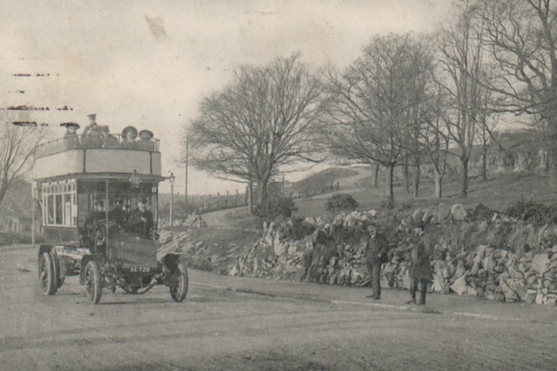 Photograph of a motor bus, possibly on the Downs in 1906.