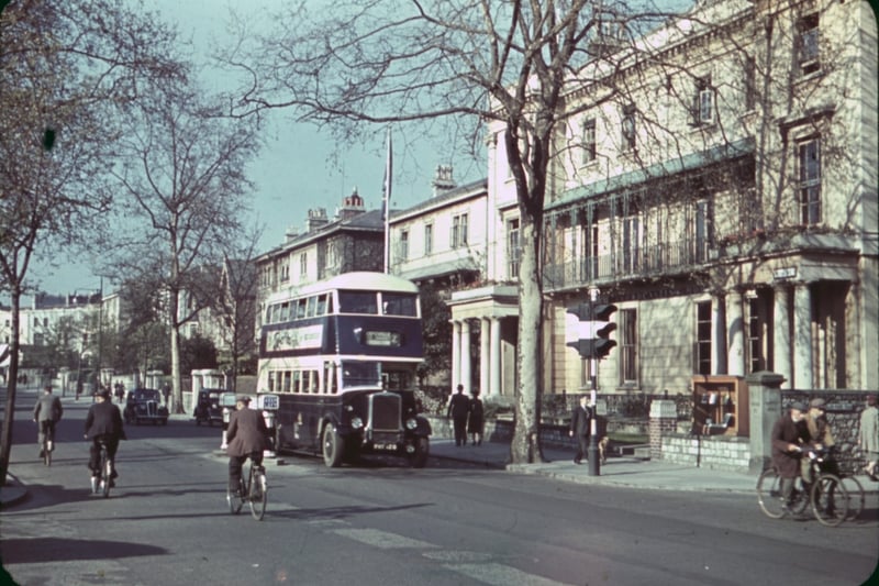 A blue Bristol Omnibus Co. bus heads down Whiteladies Road past Broadcasting House in 1939.