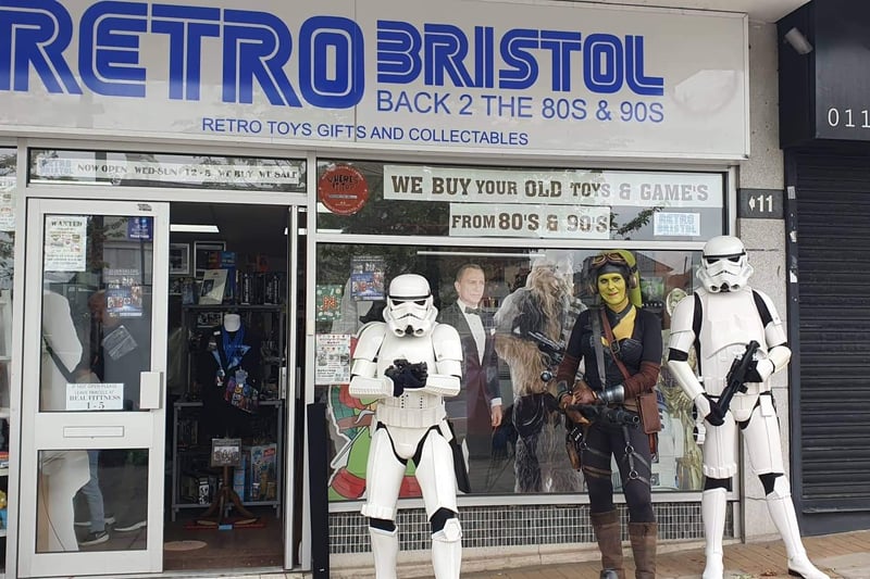 Hera and the Stormtroopers guard the retro store on Star Wars day.