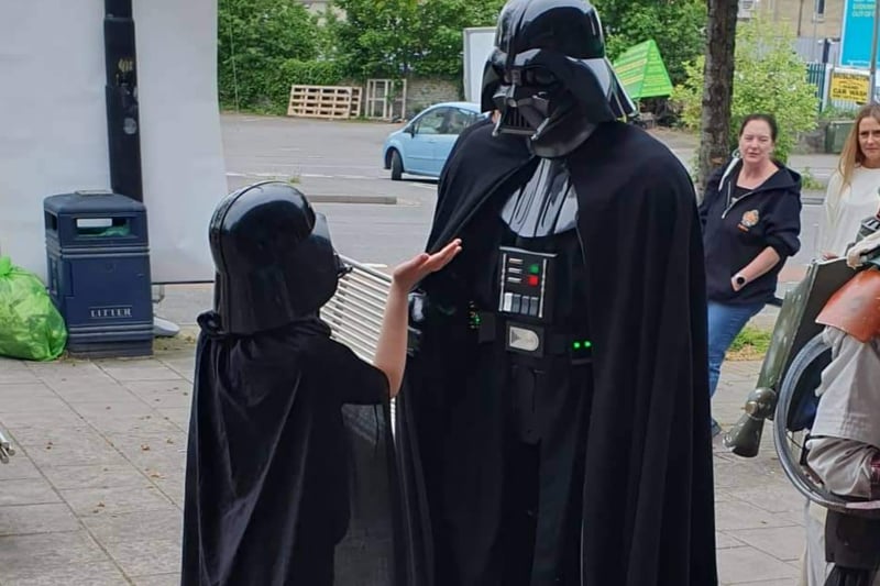 Darth Vader meets a fan dressed the same as the Star Wars icon outside Retro Bristol