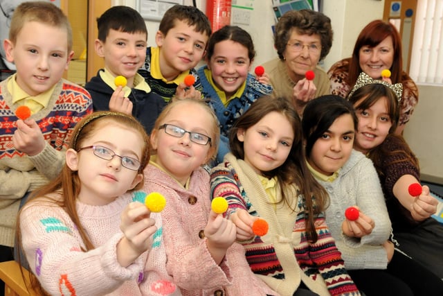 Lord Blyton Primary School pupils supported Age UK's Bobble Day in 2013. They were joined by chair of Governors Alice Malcolm and Age UK South Tyneside's Victoria Dunn, back right