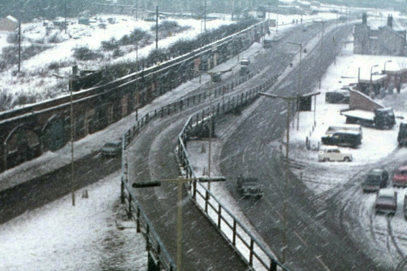In the winter of 1970, just three years after it was built, the curving exit of the flyover can be seen here with St Mary Redcliffe Church in the background.  The bridge carried around 50,000 vehicles a day.
