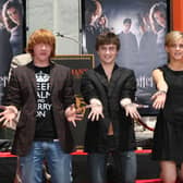 Harry Potter cast members (from left) Rupert Grint, Daniel Radcliffe and Emma Watson (photo: Alberto E. Rodriguez/Getty Images)