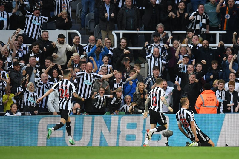 Newcastle United's English defender Dan Burn (R) celebrates with teammates after scoring his team second goal during the English Premier League football match between Newcastle United and Brighton and Hove Albion at St James' Park in Newcastle-upon-Tyne, north east England on May 18, 2023. (Photo by Oli SCARFF / AFP) / RESTRICTED TO EDITORIAL USE. No use with unauthorized audio, video, data, fixture lists, club/league logos or 'live' services. Online in-match use limited to 120 images. An additional 40 images may be used in extra time. No video emulation. Social media in-match use limited to 120 images. An additional 40 images may be used in extra time. No use in betting publications, games or single club/league/player publications. /  (Photo by OLI SCARFF/AFP via Getty Images)