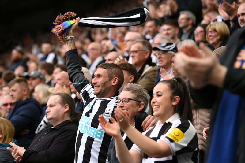 NEWCASTLE UPON TYNE, ENGLAND - MAY 18: Fans of Newcastle United celebrate their side's first goal, an own goal by Deniz Undav of Brighton & Hove Albion (not pictured) during the Premier League match between Newcastle United and Brighton & Hove Albion at St. James Park on May 18, 2023 in Newcastle upon Tyne, England. (Photo by Stu Forster/Getty Images)