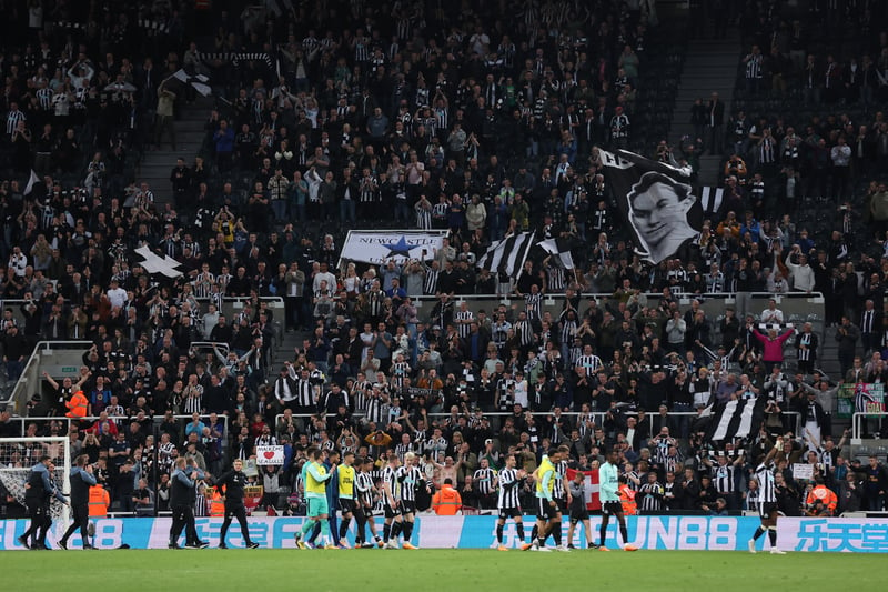NEWCASTLE UPON TYNE, ENGLAND - MAY 18: Fans of Newcastle United celebrate victory with their players after the Premier League match between Newcastle United and Brighton & Hove Albion at St. James Park on May 18, 2023 in Newcastle upon Tyne, England. (Photo by Alex Livesey/Getty Images)