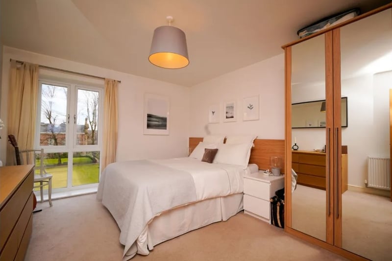 The bedroom is incredibly spacious and features a large fitted wardrobe 
