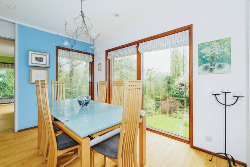 The dining room is part of the open plan living area and looks over the beautiful garden