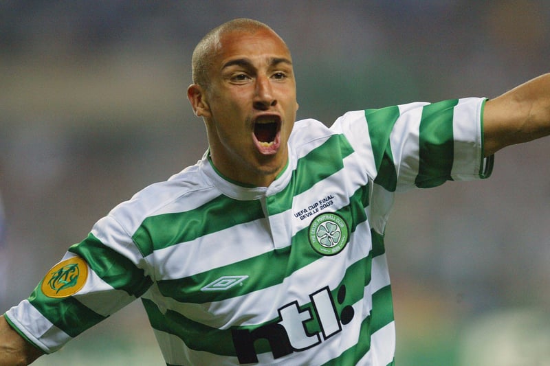 Henrik Larsson wheels away in celebration after heading home the equaliser for Celtic - his 200th goal for the club. 