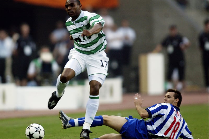 Didier Agathe manages to take the ball past Porto midfielder Maniche.