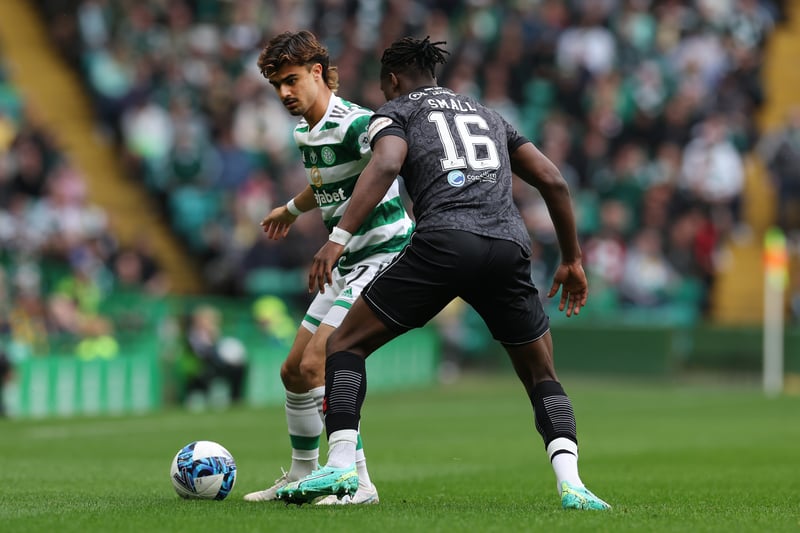 Portuguese winger Jota is put under pressure by Saints full-back Thierry Small in a close battle between the pair. 