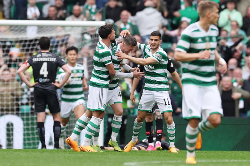 Callum McGregor is mobbed by his Hoops team-mates and hauling Celtic back on level terms against the Paisley outfit. 