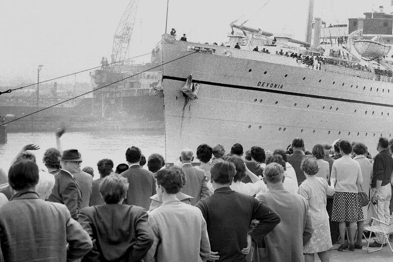 Look at the scene on the dockside as these parents wave goodbye in 1967. The ship was off to Gibraltar.