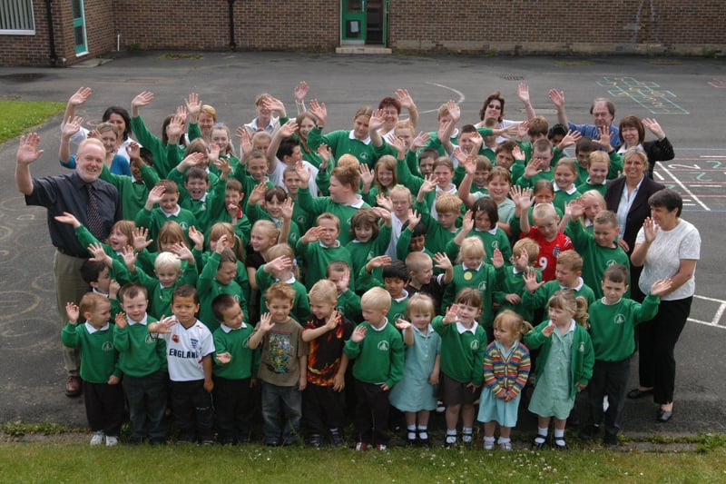 Staff and pupils say goodbye at Harraton Primary School in July 2004.