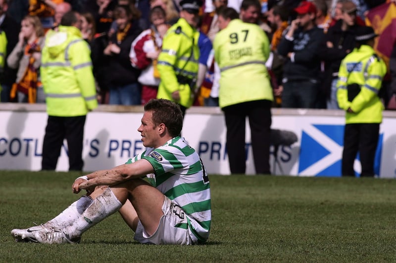 Celtic had let the silverware slip from their grasp from a leading position and there was no consoling a shattered Craig Bellamy as he slumps to the Fir Park turf in disappointment.
