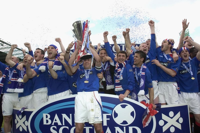 The helicopter pilot had to make an abrupt U-turn and hot-foot it through to Edinburgh as the Light Blues squad revelled in their unexpected triumph. Here is the moment captain Fernando Ricksen hoisted the trophy aloft. 