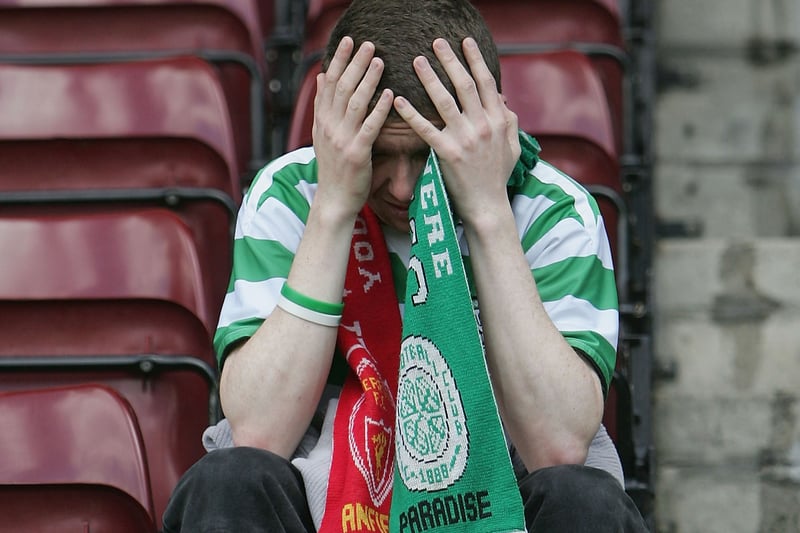 One Celtic fan holds his head in his hands in utter disbelief after watching his team throw away the trophy. Martin O’Neill and his players knew they only had themselves to blame. 