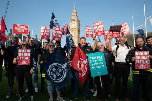 Demonstrators gathered at Parliament Square to protest the Strikes (Minimum Service Levels) Bill. (Credit: Lucy North/PA Wire)