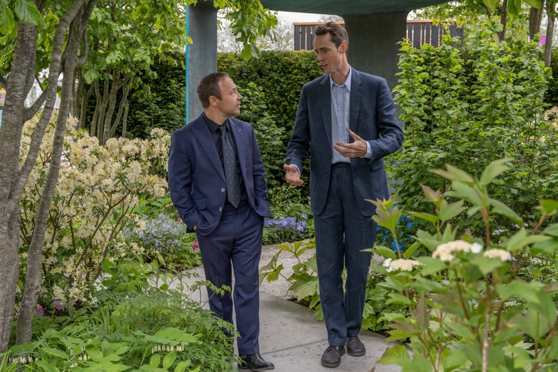 Stephen Graham with designer, Charlie Hawkes at the Rare Space Sanctuary Garden he has designed for The National Brain Appeal at the RHS Chelsea Flower Show.