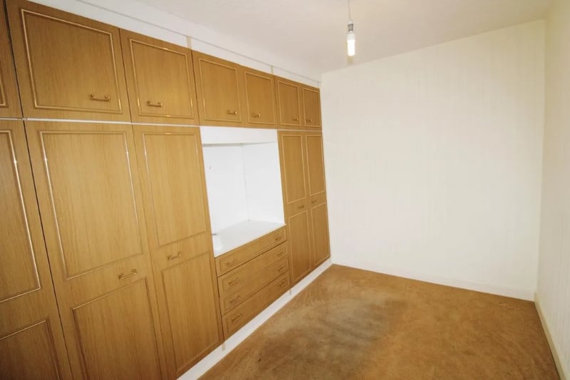 The first bedroom has lots of fitted wardrobes which offer plenty of storage space 