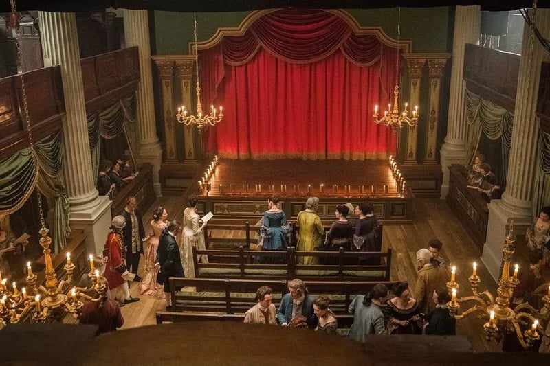 The inside of St Andrew’s in the Square was used to film the theatre scenes in season 4 episode 8,Wilmington. Filming also took place outside the church. It was here that Sophie Skelton and Tobias Menzies can be seen in the scene when Frank talks to Bree about moving to England.