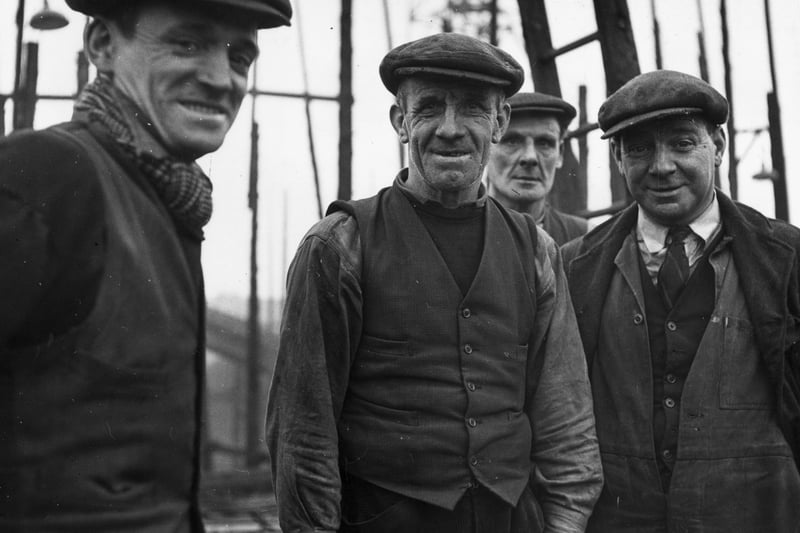 Four workers from the Harland & Wolff Shipyard on Clydeside near Glasgow.