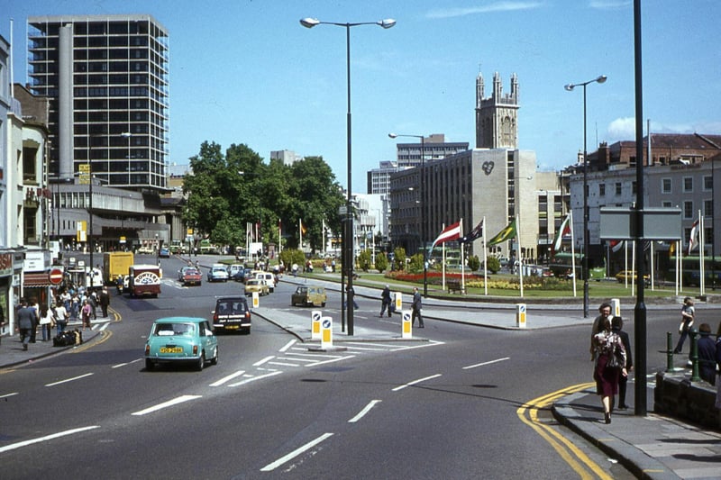 Taken in the summer of 1978, this colourful shot taken from the bottom of College Green shows St Augustine’s Parade and the well manicured lawns of the city centre gardens.
