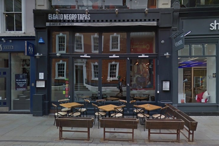 El Gato Negro Tapas is spread over 3-storeys of a converted townhouse and includes an outdoor area at the entrance. The tapas bar has a rating of 4.6 out of 5 from 2,829 Google reviews. You can visit at 52 King Street, Manchester M2 4LY.