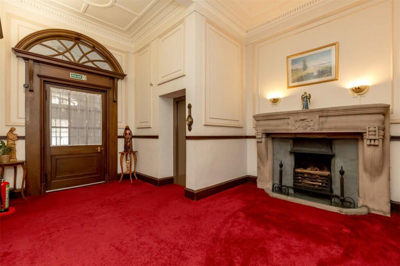 From the entrance vestibule - the property opens into the reception hall.