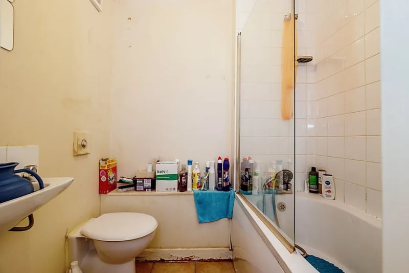 The bathroom could use some fixing but is a good size with a bath and shower combo